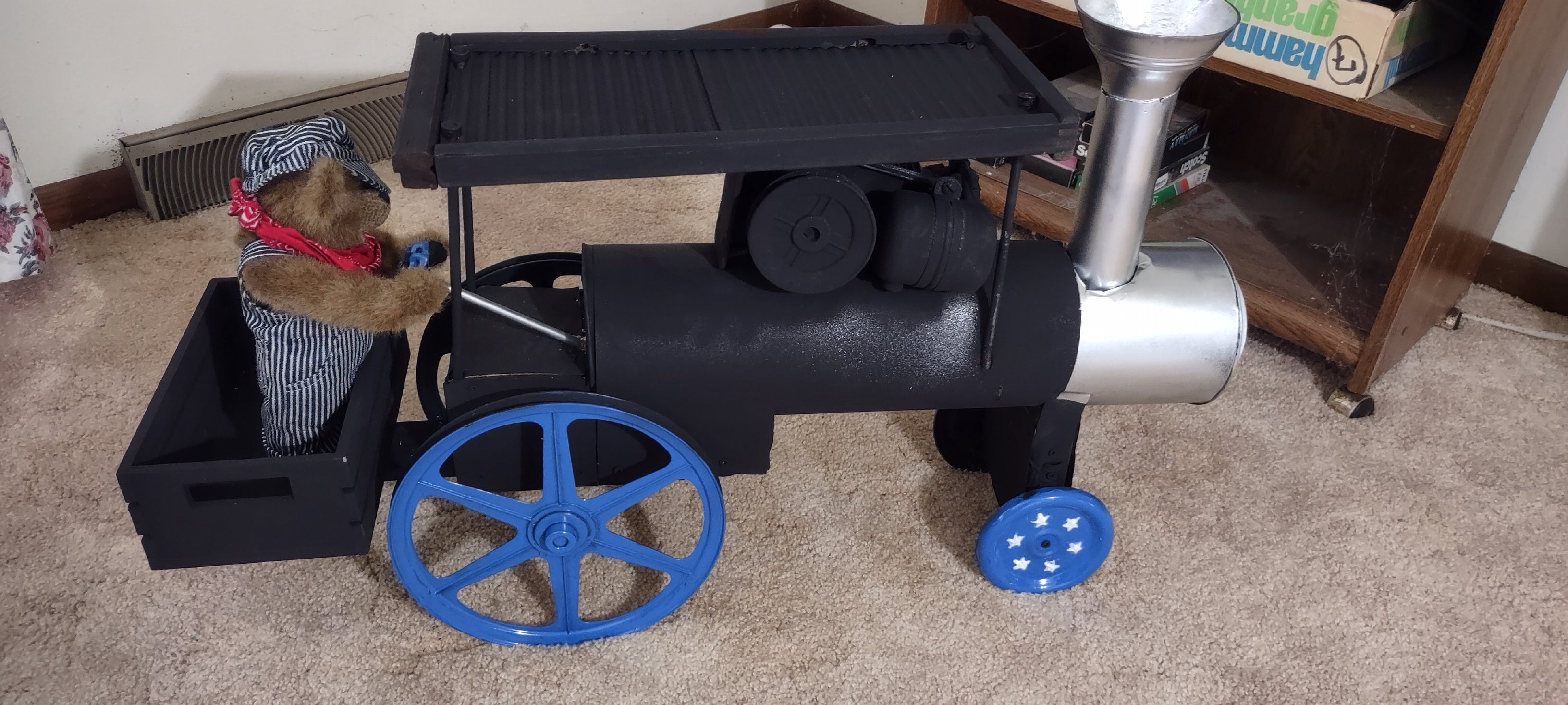 Steambeary the engineer on his Baker Steam Engine