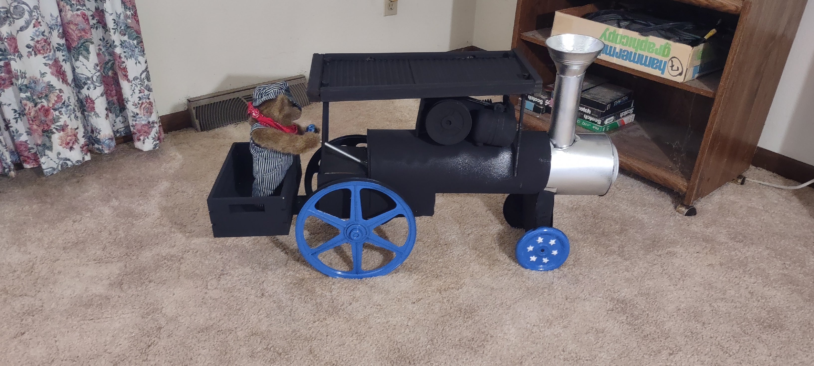 Steambeary the engineer on his Baker Steam Engine